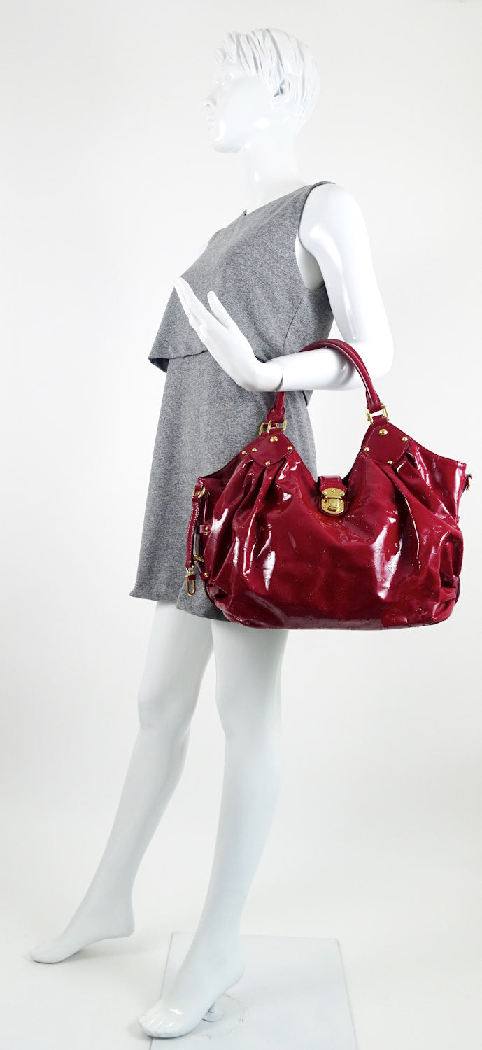surya mahina patent leather hobo bag