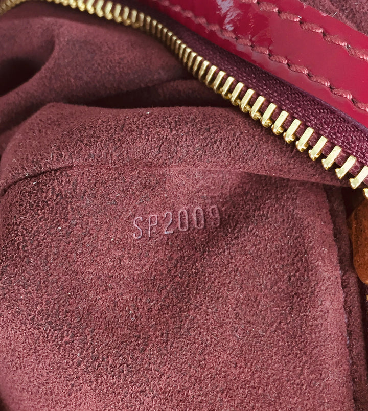 surya mahina patent leather hobo bag