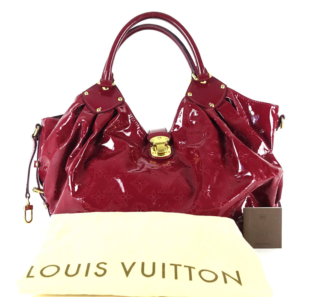 surya mahina patent leather hobo bag