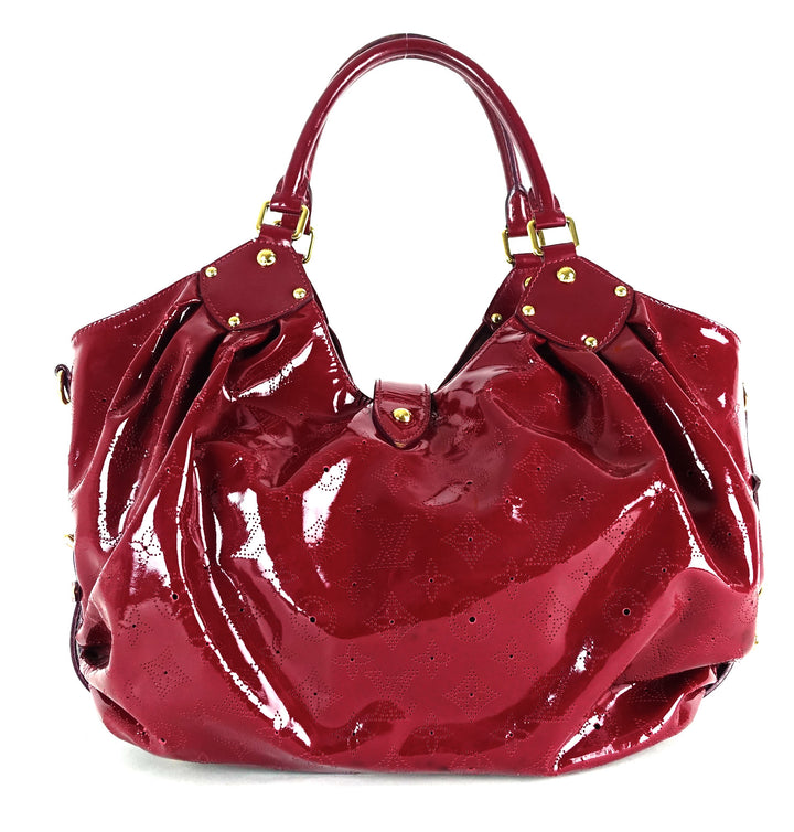 surya mahina patent leather hobo bag