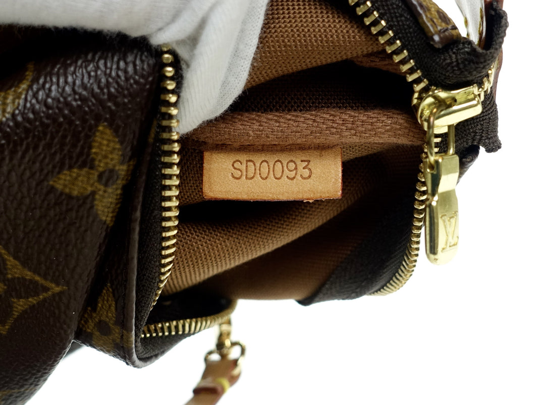pochette accessoires monogram canvas evening bag