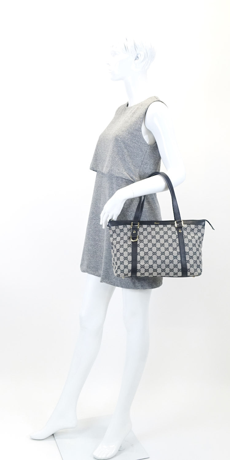 abbey monogram canvas zip tote bag