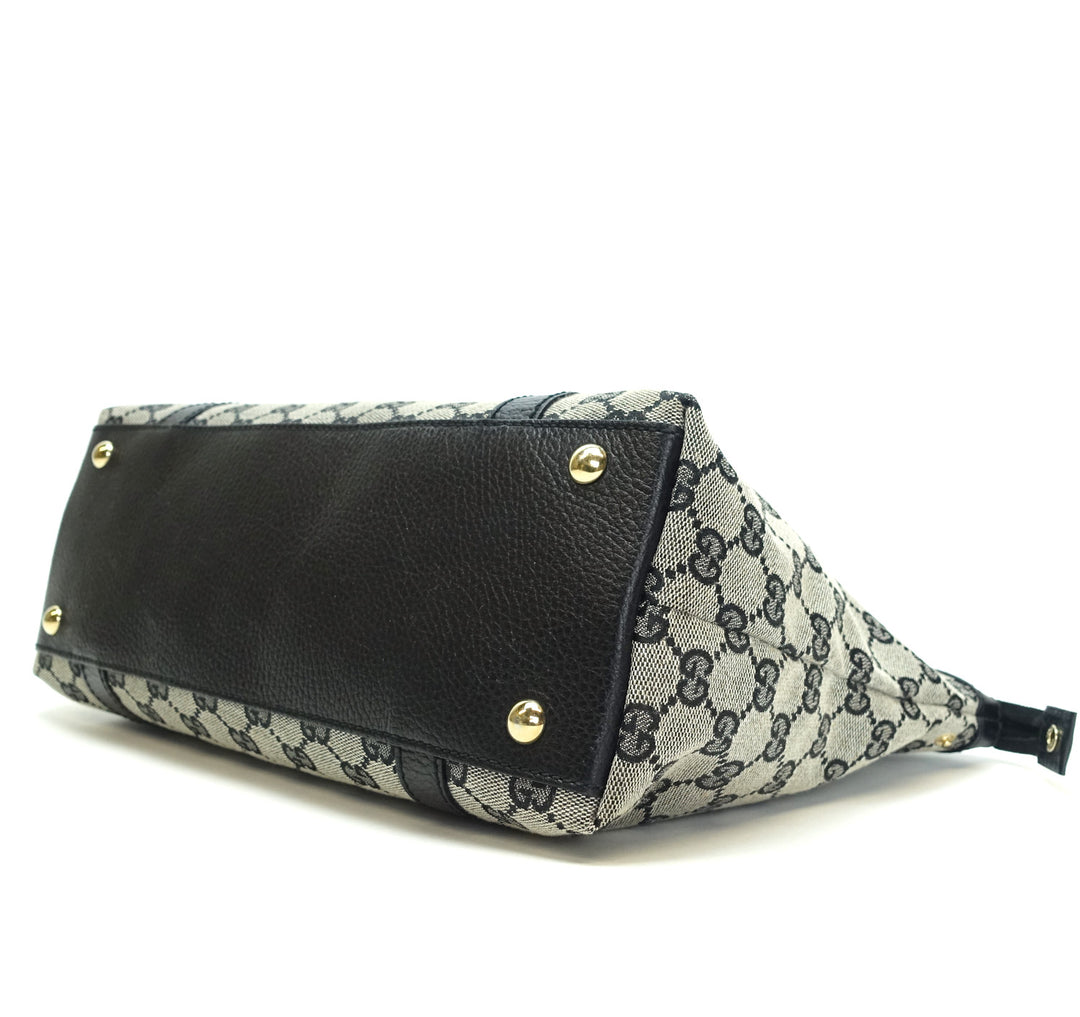 abbey monogram canvas zip tote bag
