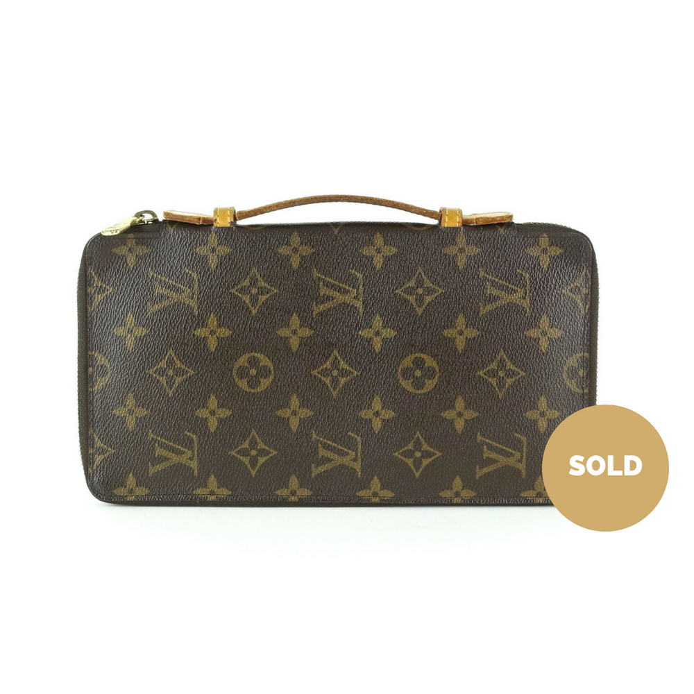 monogram canvas organizer de voyage travel wallet